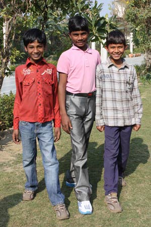 The boys are happy about their new shoes