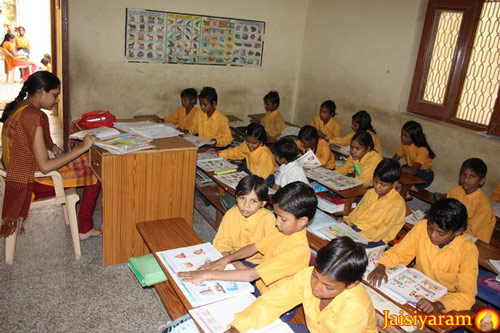 Students with their Teacher in School