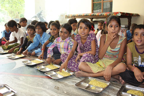 Children of all Castes eating together in our School