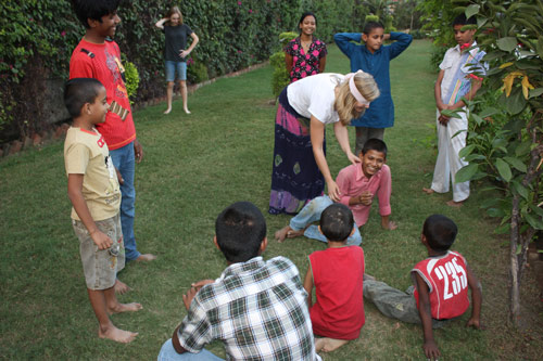 Guests playing with Children in the Garden
