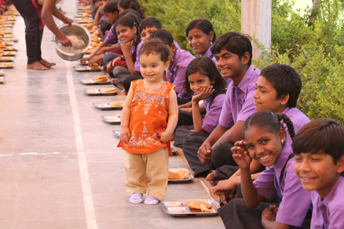 Apra with school children