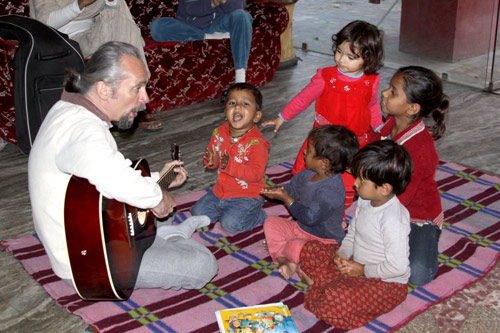 Thomas making Music with the Children of the Ashram