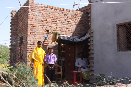 Sudeep and his Family in front of his House