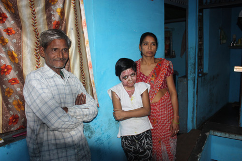 Monika and her Parents at their home