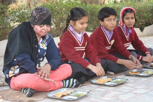 Monika at Lunch with the other Children