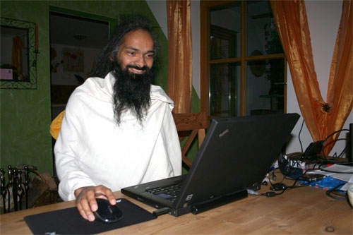 Swami Ji working on the internet