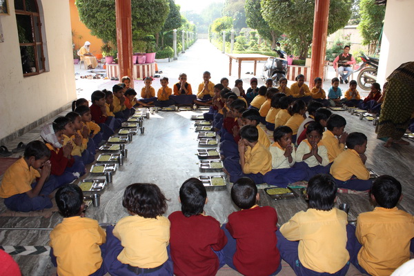 The children having lunch at the Ashram in India