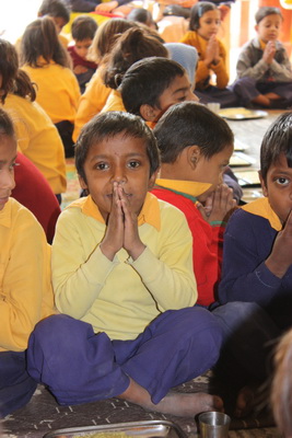 Children at lunch - sponsor the food for a day