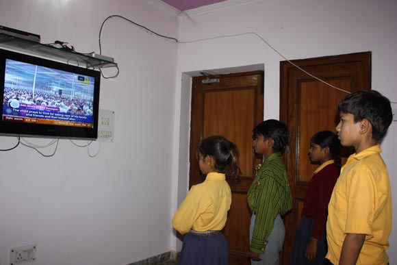 Indian children watching TV